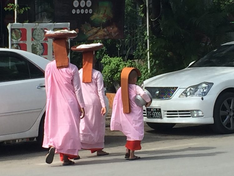 People in traditional clothes in Myanmar